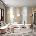 Cozy Modern Lounge Area Interior With Curved Sofa Stools And Colorful Wall Decor