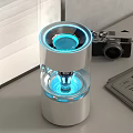 Modern Electronic Appliance With White Casing Blue LED Light And Transparent Structure Design 3d model