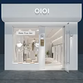 OIOI Clothing Store Interior With White Decor Arched Doorway Display Shelves And Chair