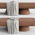Brown Sofa Bench with Gray Blanket Draped Over and Cylindrical Legs Design 3d model