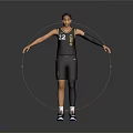 Basketball Player in Black Jersey with Number 22 Standing with Arms Outstretched Against Gray Background