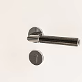 Sleek Modern Door Handle Featuring Textured Black Grip And High Quality Stainless Steel Finish