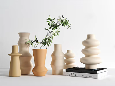 Decorative Vases With Greenery Various Shapes Neutral Tones Arranged With Stack Of Books 3d model