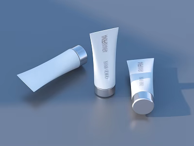 Elegant White Cosmetic Skincare Tubes With Silver Lids And Modern Minimalist Design 3d model