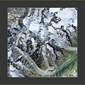 3D Terrain Model of Snowy Mountain Range With Glaciers and Green Valleys