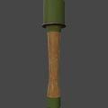 Green Cylindrical Object With White Triangle Logo And Wooden Handle