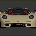 Cream High Performance Sports Car With Sleek Design Rear Spoiler And Alloy Wheels