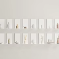 Minimalist Modern Decorative Ornament Combination with Vases Cups and Sculptures on White Shelves White Wall