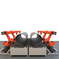 Automated Industrial Equipment With Orange Robotic Arms Handling Large Pipes On Conveyor Belts