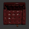 Red Tufted Armchair With Orange Swivel Base And Elegant Button Details