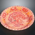 Traditional Carved Circular Plate with Red Dragon Pattern and Decorative Border