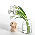 Clear Glass Vase With White Calla Lilies And Wooden Monkey Figurine For Home Decor