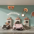 Fun Children's Playground with Pink Gray Toy Cars Gas Station Parking Sign and Welcome Decor