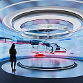 Tech Exhibition Hall Featuring Modern Design Curved Screens And Robotic Arm Display With Female Visitor