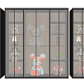 Modern Display Cabinet With Open Grid Shelves And Various Decorative Figurines