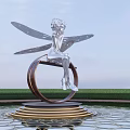 Silver Fairy Sculpture With Wings On Circular Golden Striped Base By Pond