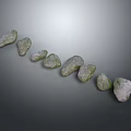 Decorative Green Stone Pieces With White Textures Arranged In Curved Line On Gray Background