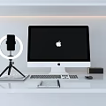Apple iMac Desktop Workspace With Monitor Keyboard Mouse Phone Stand And Ring Light