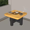 Golden Textured Coffee Table With Black Legs Books Tray And Decorative Branch In Bright Room