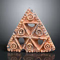 Triangular Carved Terracotta Artifact With Spiral Patterns And Hollow Decorative Design