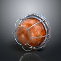 Orange Round Light Fixture With Metal Mesh Cover And Reflective Surface Design