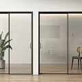 Modern Glass Sliding Doors with Black Frames Bright Interior Green Plant Wooden Chair and Floor