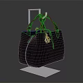 Black Quilted Handbag With Handles And Small Decorative Charm On Transparent Display Stand