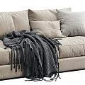 Comfortable Three-Seater Sofa with Throw Pillows and Cozy Blanket in Light Beige and Dark Brown