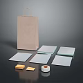 Brown Paper Bag With White Square Pads Yellow Blocks And Tape Roll