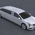 White Cadillac Luxury Limousine Featuring Extended Body And Modern Front Grille Design