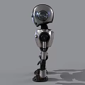 Game Movie Robot Character With Silver Metallic Body Round Glowing Eyes And Mechanical Joints