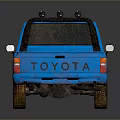 Blue Single Cab Pickup Truck With Tow Hook And Muddy Wheels