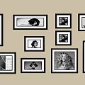 Stylish Photo Wall With Multiple Black And White Portrait Frames On Beige Wall