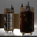 Elegant Round Wheeled Wine Cabinet With Open Doors Red Wine Bottles Glassware And Decorative Flowers