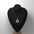 Elegant White Circular Pendant With Red Center On Metallic Chain Displayed On Black Mannequin