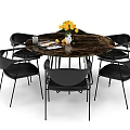 Round Marble Top Dining Table Set With Black Metal Leg Chairs And Yellow Flower Decor