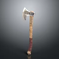 Decorative Axe With Intricate Metal Head And Carved Wooden Handle