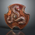 Intricate Dragon Pattern Shield Shaped Decorative Ornament With Metallic Finish And Central Gemstone