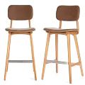 Modern Brown Bar Stools With Wooden Legs And Upholstered Seats For Kitchen Space