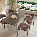 Modern Dark Dining Table With Leather Chairs And Metal Legs Near Window Greenery