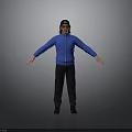 Man in Blue Jacket Black Cap and Black Pants with Arms Outstretched Against Gray Background