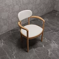 Comfortable Leisure Chair With White Padded Seat Wooden Armrests And Gray Patterned Wall Marble Floor