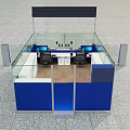 Modern Blue And White Service Counter With Glass Partitions And Computer Workstations