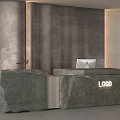 Modern Stone Reception Desk With Illuminated LOGO Computer Monitor Small Plant And Textured Gray Wall