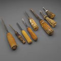 Old Worn Weapons With Wooden Handles And Metal Blades Collection