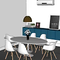 Dining Table Set with White Chairs Blue Cabinets Pendant Light and Chalkboard Decor