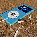 Blue iPod With White Earphones On Wooden Surface And Screen
