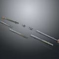 Metallic Rods And Small Components With Glossy Finish On Dark Background