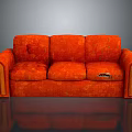 Worn Orange Sofa With Torn Seats And Visible Fabric Damage