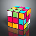 Colorful 3D Rubik's Cube With Vibrant Colored Blocks On Reflective Surface